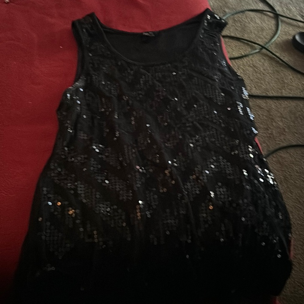 It’s a sequin tank top